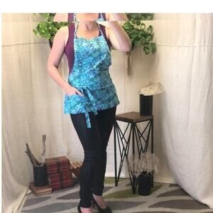 A Wonkey Donkey Bicycle wheel multi pocket Artist Apron O/S fits most